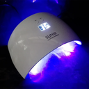 Lámpara de uñas mediana sun 9x 24 w blanca