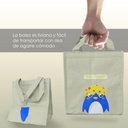 Lonchera gris con pinguino